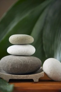 Tray of stacked massage stones