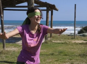 Young Woman Playing Blindman's Buff