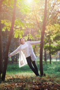 Happy in autumn forest